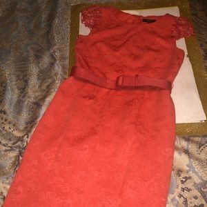 Coral or orange midi dress with belt